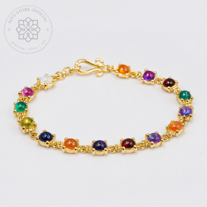 NAVARATNA ORBIT — Genuine Navaratna Cabochon Gemstone Bracelet นพรัตนมณฑล สร้อยข้อมือพลอยนพเก้าแท้ แบบเรียงพลอยหลังเบี้ย