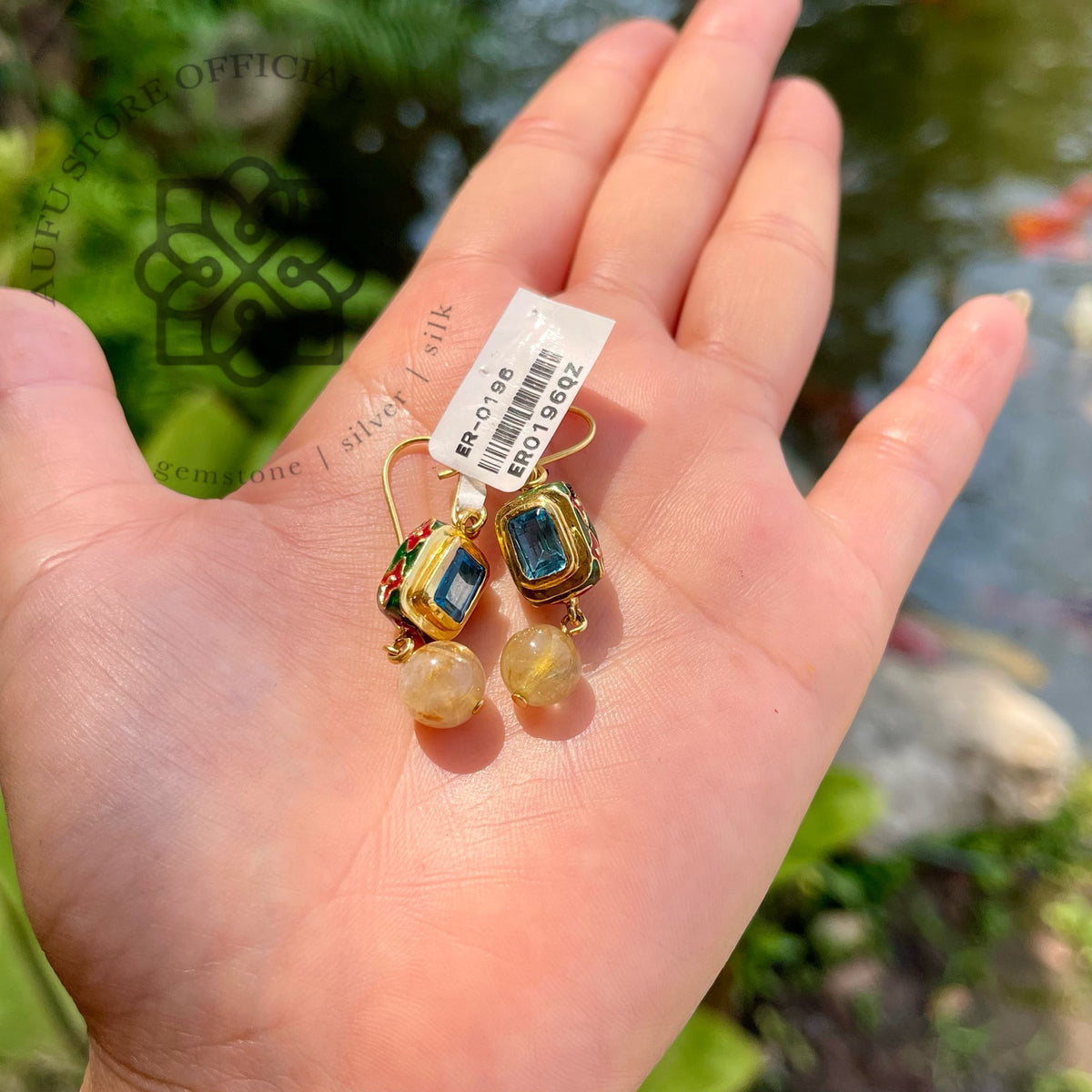 ต่างหูบลูโทพาสแท้ แบบห้อย ประดับพลอยโทนทอง Genuine Blue Topaz Drop Earrings with Golden-Tone Gemstone Drops