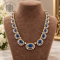 SAPPHIRE CELESTIA Necklace แซฟไฟร์ เซเลสเทีย — สร้อยคอไพลินเจียระไน ล้อมพลอยขาว ดีไซน์หรู