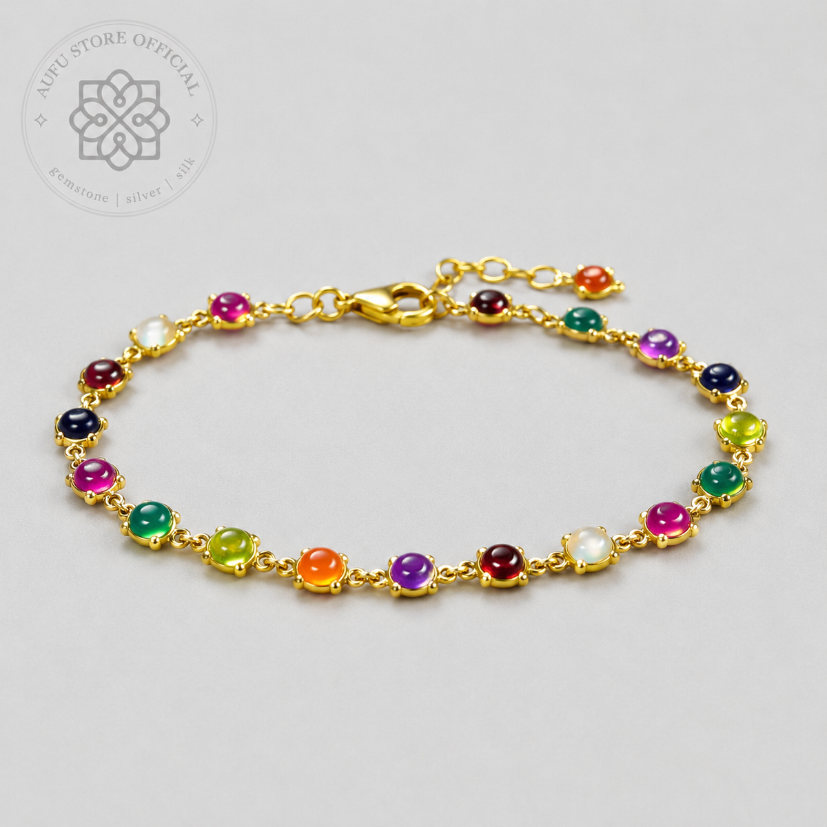 NAVARATNA ORBIT — Genuine Navaratna Cabochon Gemstone Bracelet นพรัตนมณฑล สร้อยข้อมือพลอยนพเก้าแท้ แบบเรียงพลอยหลังเบี้ย