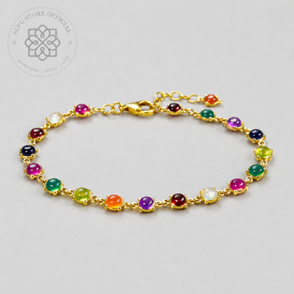 NAVARATNA ORBIT — Genuine Navaratna Cabochon Gemstone Bracelet นพรัตนมณฑล สร้อยข้อมือพลอยนพเก้าแท้ แบบเรียงพลอยหลังเบี้ย
