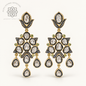 DIAMOND LOTUS NOIR ไดมอนด์ โลตัส นัวร์ — ต่างหูเพชรซีก ดีไซน์ Heritage แบบห้อยประดับ
