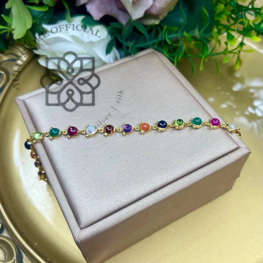 NAVARATNA ORBIT — Genuine Navaratna Cabochon Gemstone Bracelet นพรัตนมณฑล สร้อยข้อมือพลอยนพเก้าแท้ แบบเรียงพลอยหลังเบี้ย