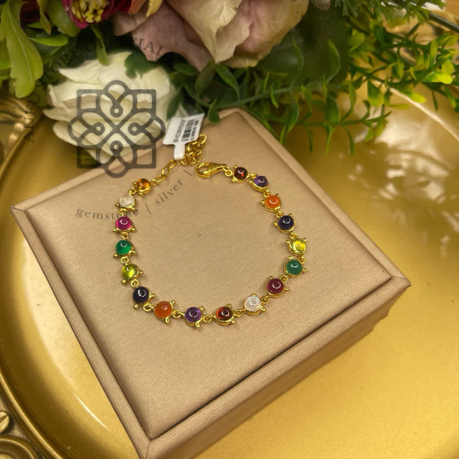 NAVARATNA ORBIT — Genuine Navaratna Cabochon Gemstone Bracelet นพรัตนมณฑล สร้อยข้อมือพลอยนพเก้าแท้ แบบเรียงพลอยหลังเบี้ย